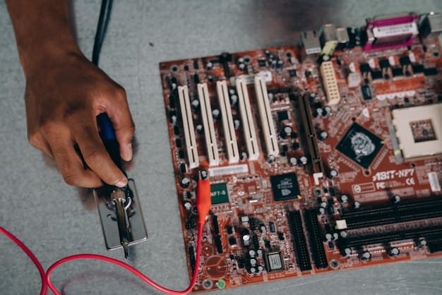 Close-up of a technician's hands working inside a PC case, with various components visible.