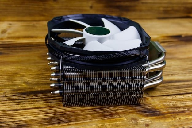 A detailed shot of a Noctua NH-D15 CPU cooler installed on a motherboard, showing its large heat sink and dual fans designed for quiet operation. The focus is on the engineering that minimizes noise while maximizing cooling performance.